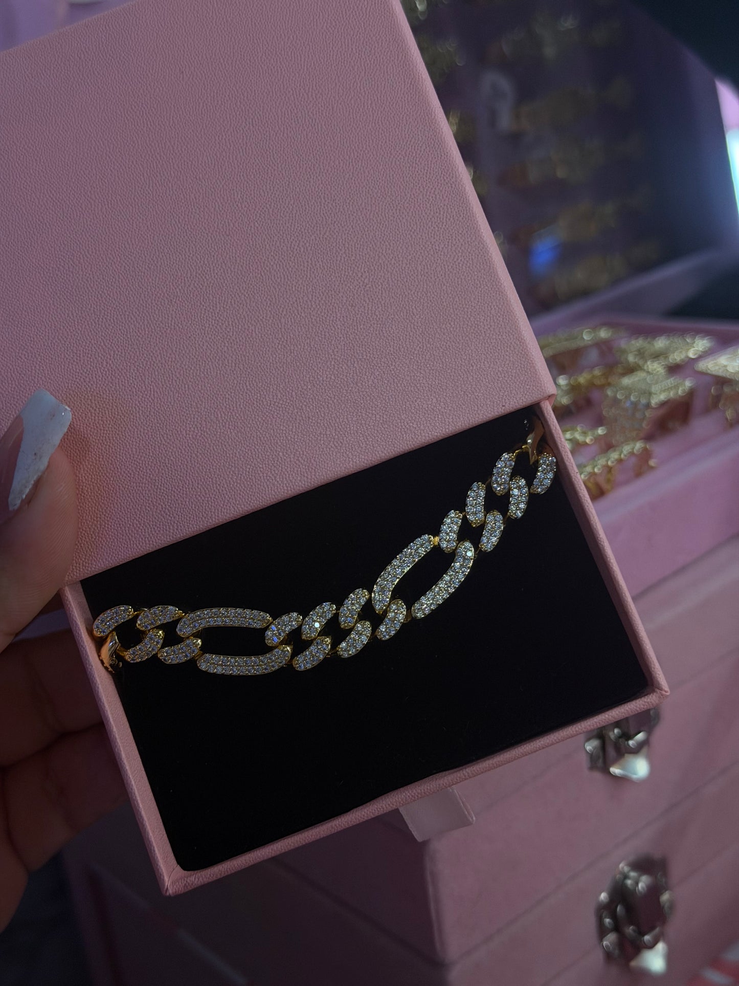 Iced out figaro bracelet